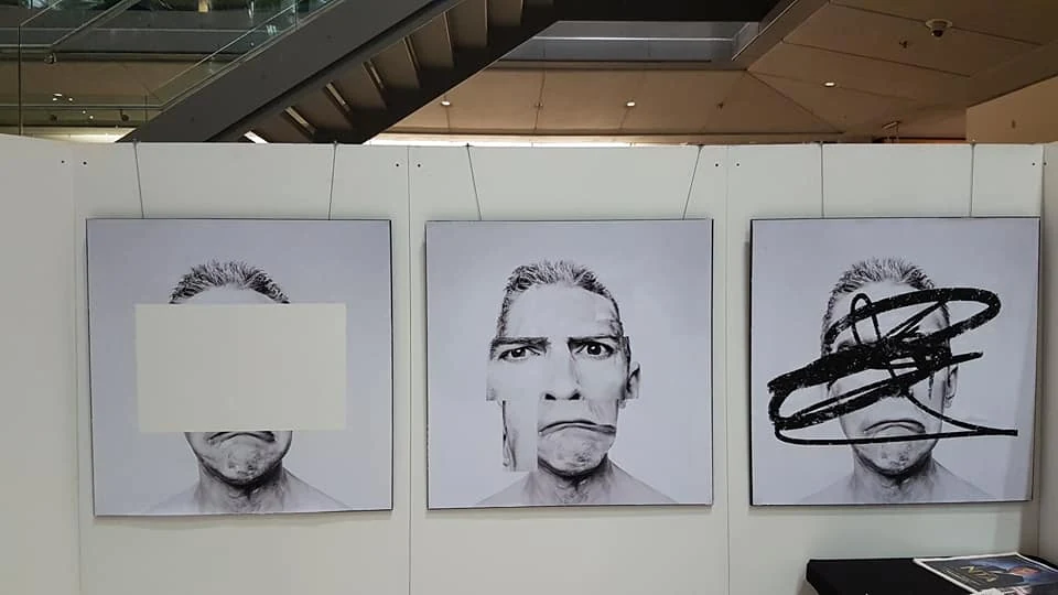 Three portraits on the exhibition panels