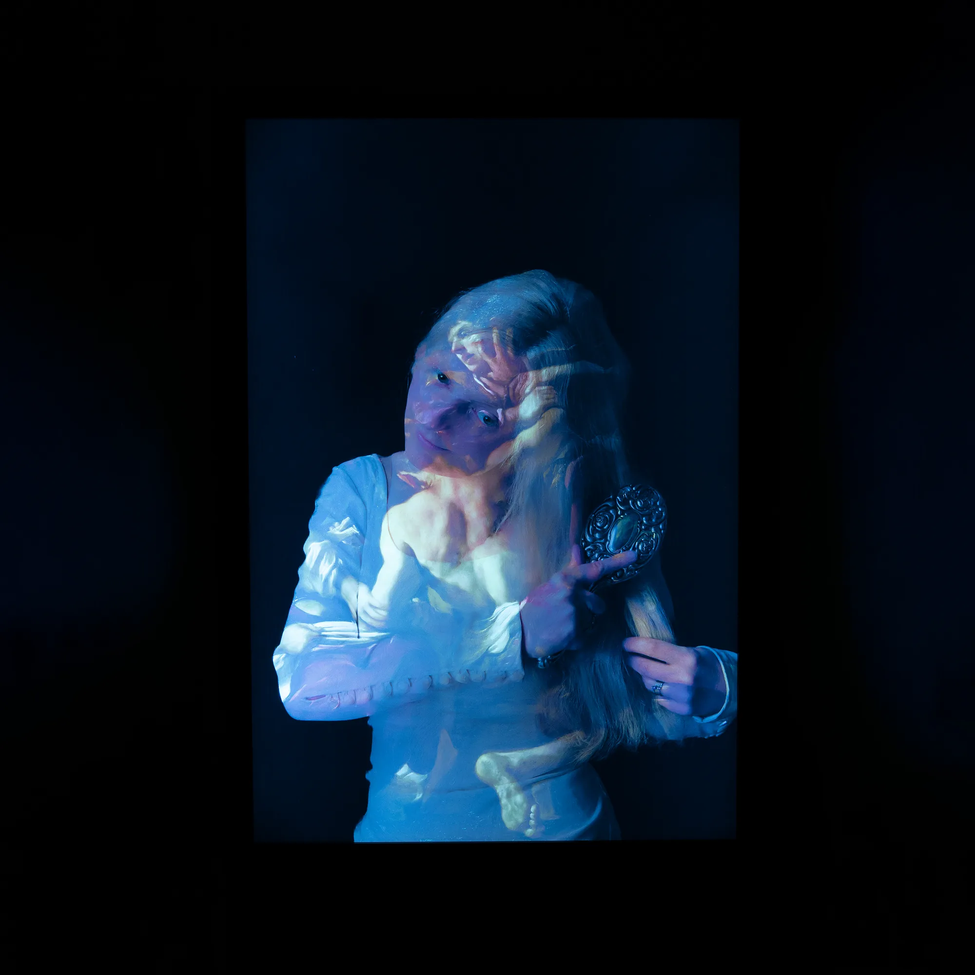 The Weight of Silence glowing in the dark gallery